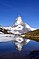 Matterhorn (4,478 m, Walliser Alps, East side) mirrored in Riffelsee lake. 45°59′0.3″N 7°45′46.0″E﻿ / ﻿45.983417°N 7.762778°E﻿ / 45.983417; 7.762778