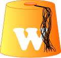 Orange fez white W black tassel.svg