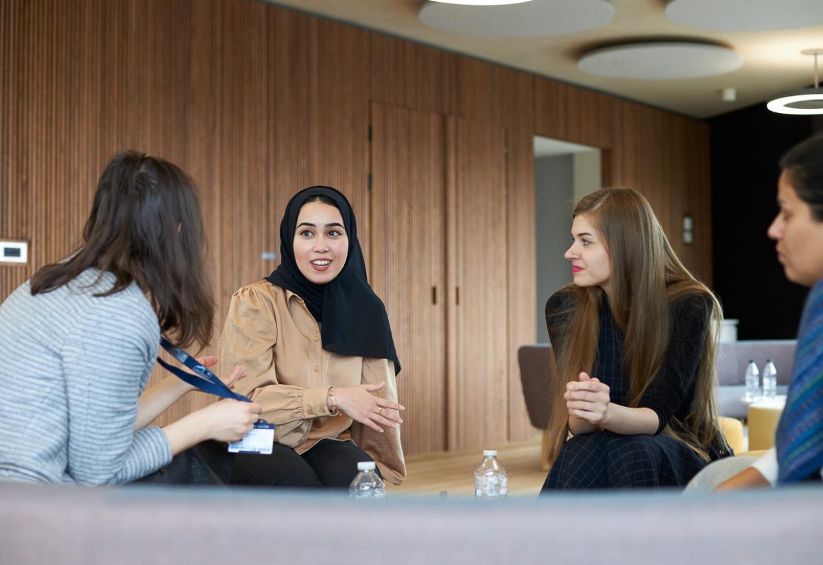 Group of female RPLP participants talk during a breakout session