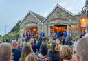 Guests gather to celebrate the official reopening of The Pier House after a devastating fire