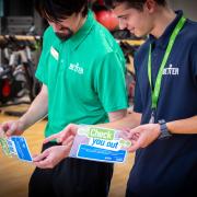 Stickers aimed at gym-goers and swimmers to look out for potential signs of cancer are being placed in leisure centres across Cornwall