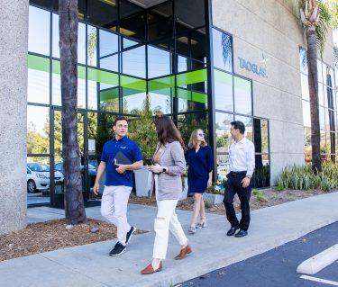 Taoglas employees and the clients walking outside office