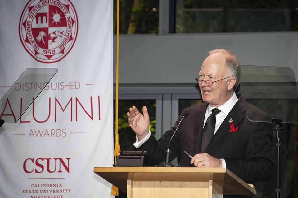 Man standing at podium