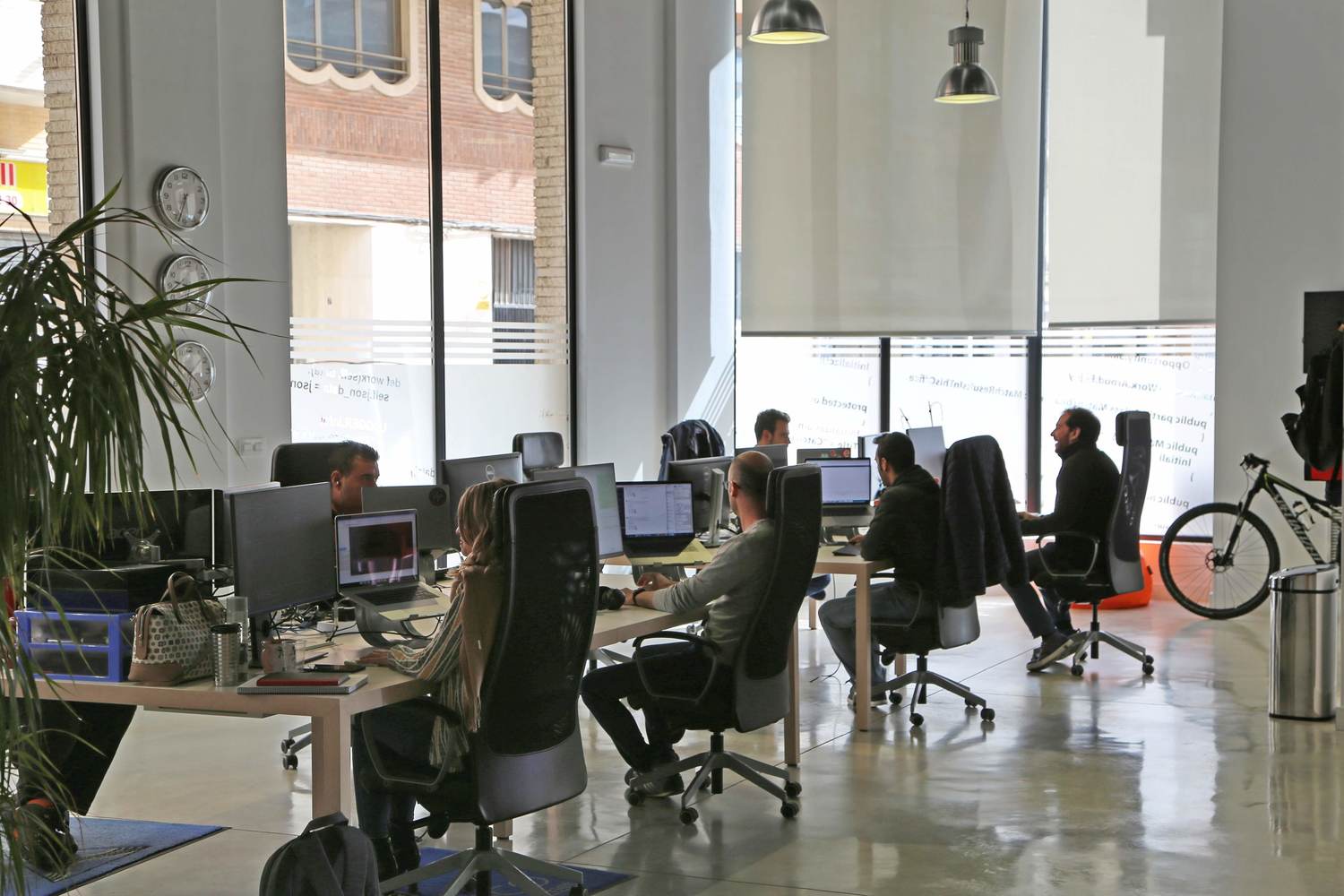 Wheel, Bicycle, Furniture, Indoors, Office, Table, Person, Desk, Chair, Computer