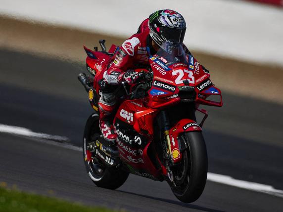 Ducati Lenovo Team's Italian rider Enea Bastianini takes part in a practice session of the MotoGP British Grand Prix at Silverstone circuit in Northamptonshire, central England, on August 2, 2024. (Photo by BENJAMIN CREMEL / AFP)