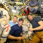 NASA astronaut Matthew Dominick with Oleg and Nokolai on the Orlan Lights and TV