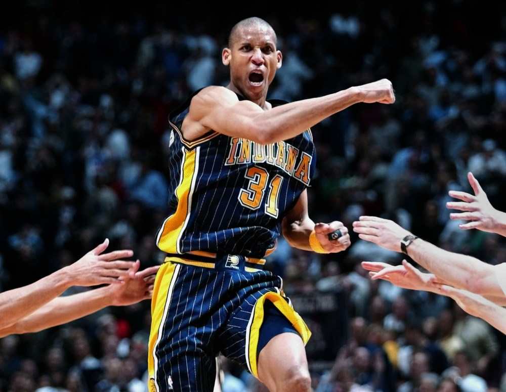 Reggie Miller celebrates