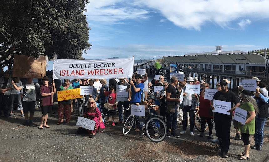 The protesters, with Matiatia ferry terminal in the background (photo: Duncan Greive) 
