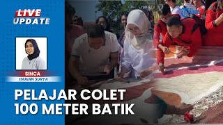 Sambut Hari Batik, Ratusan Pelajar Bondowoso Mencolet Batik 100 Meter Kain di Monumen Gerbong Maut