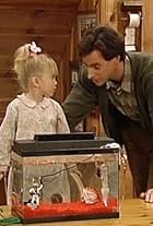 Mary-Kate Olsen and Bob Saget in Full House (1987)