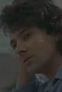 Mickey Thomas in Starship: Sara (1985)