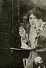 Pauline Bush in The Harvest of Flame (1913)