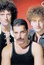 Roger Taylor, Brian May, Freddie Mercury, John Deacon, and Queen in Queen: I Want to Break Free (1984)