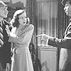 Miles Mander, Dick Powell, and Anne Shirley in Murder, My Sweet (1944)