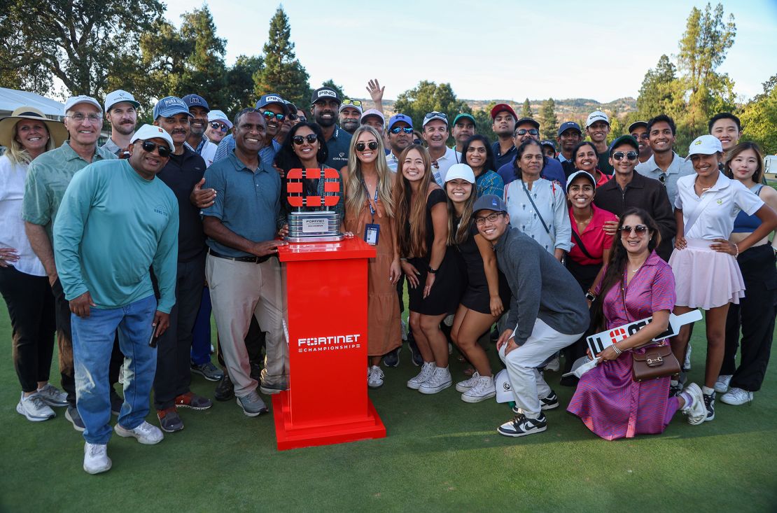 NAPA, CALIFORNIA - SEPTEMBER 17: Sahith Theegala of the United States celebrates with friends and family alongside the trophy after winning during the final round of the Fortinet Championship at Silverado Resort and Spa on September 17, 2023 in Napa, California. (Photo by Jed Jacobsohn/Getty Images)