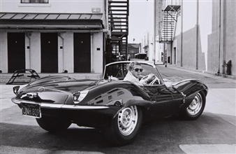 Steve McQueen in black Jaguar at Studio, CA - John Dominis