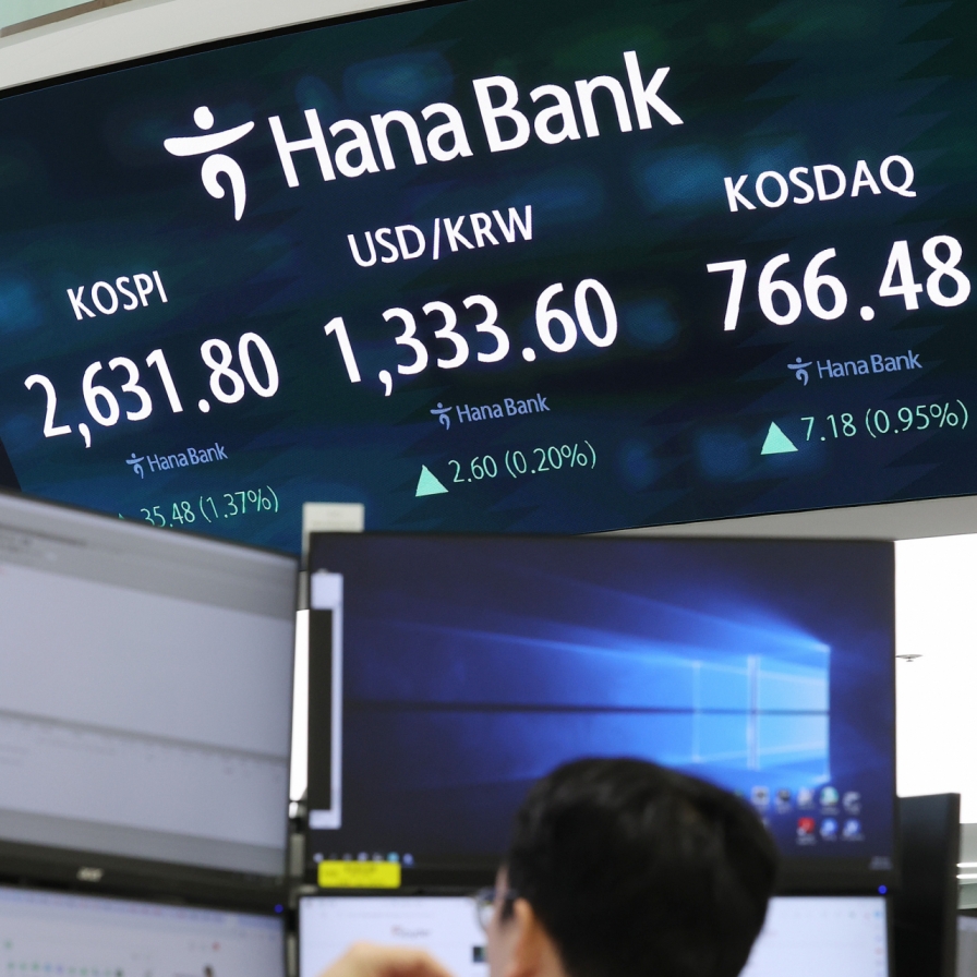 Seoul shares open higher on rate cut hopes