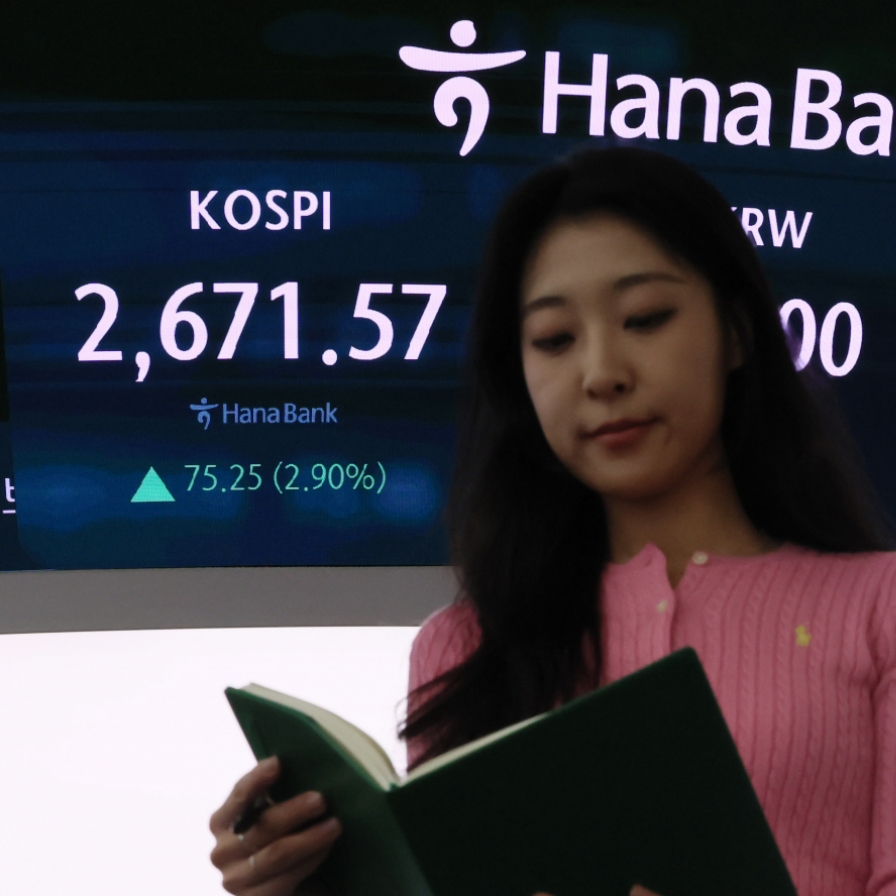 Seoul shares spike nearly 3% on US rate cut hopes