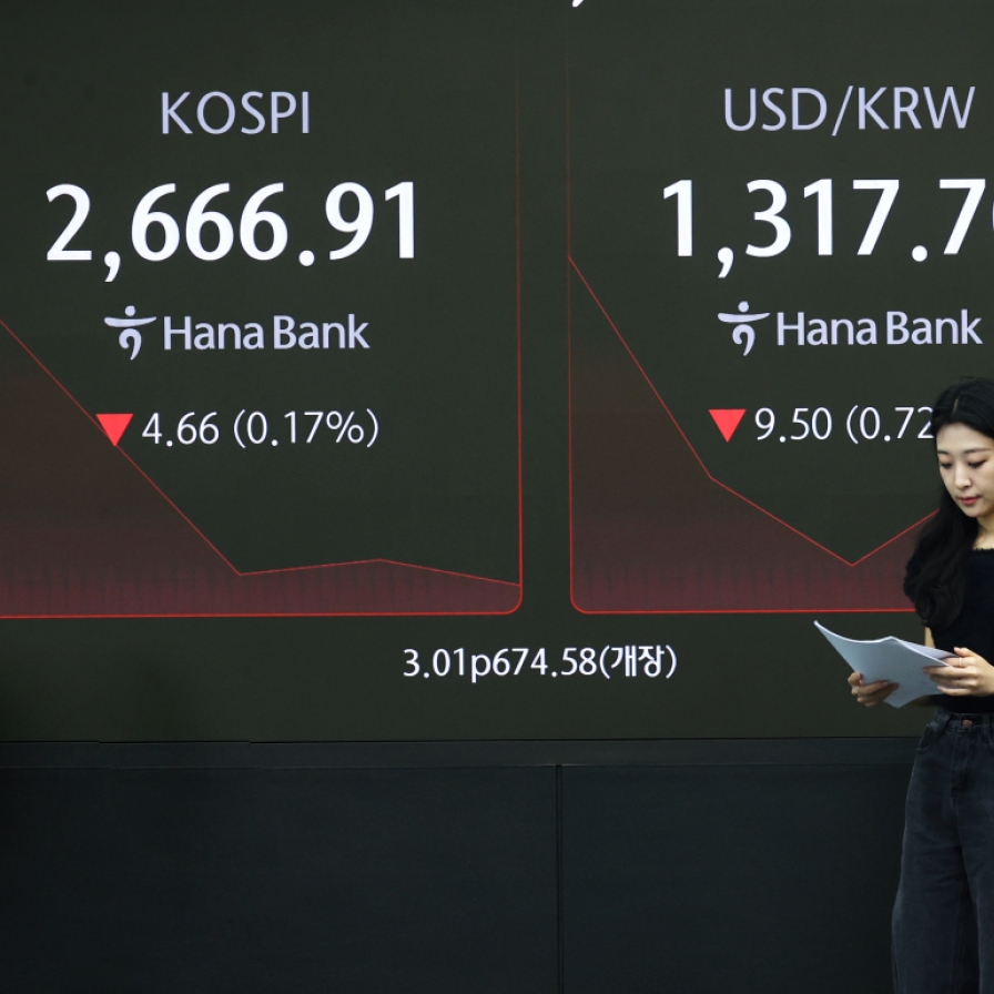 Seoul shares open tad higher on Wall Street gains