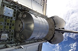 The Leonardo Multi Purpose Logistics Module rests in Discovery's payload bay