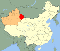 Hami prefecture (red), location of the Kumul Khanate, in Xinjiang (orange) (modern borders shown)