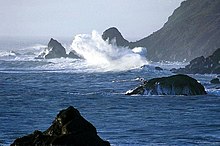 Coastal waters with various rocky masses protruding