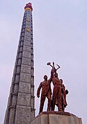 Up-close view of the Juche Tower and the accompanying monument to the Workers' Party of Korea