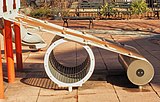 Detail of play structure showing press-roller motif.