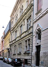 The Emich Palace (Ferenc Novák, 1896), Horánszky utca 16. Built for royal courtier and owner of the Athenaum printworks Gusztáv Emich as three enormous apartments, one on each floor.[78][79] Sold in 1913 to Count Aurél Dessewffy, judge and Speaker of the-then House of Magnates.