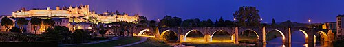 Fortified city of Carcassonne, France, and the Pont Vieux crossing the Aude river