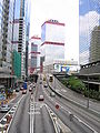 Connaught Road West Flyover leading up to the Shun Tak Centre (background) in August 2005