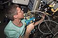 Sergei Krikalev makes repairs to the Elektron oxygen generator in the Zvezda Service Module