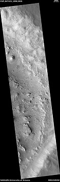 Wide view of layers in crater, as seen by HiRISE under HiWish program. Parts of this image are enlarged in other images that follow.