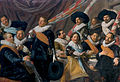 "Feestmaal Officieren van de St. Jorisschutterij, Haarlem, 1627" (c.1626-1627) Frans Hals Museum;Lieutenant Jacob Pietersz Olycan als zittende centrale figuur.