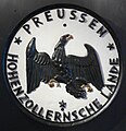 Hohenzollern emblem with the eagle of the Free State of Prussia and the province's alternative name, Hohenzollernsche Lande.