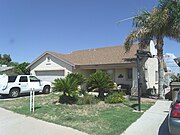 The Castillo House was built in 1915 and is located at 8180 Monroe St. It is listed in the Peoria Register of Historic Places.