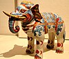 brightly coloured ceramic in the style of an elephant