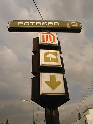 Picture of a standing sign indicating the entrance.