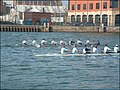 Queen's University Belfast Boat Club based in Stranmillis, racing University College Dublin on the River Lagan.