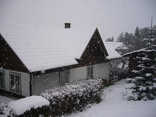 A house in snowfall