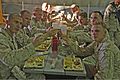 Marines of Combat Logistics Battalion 6, 2nd Marine Logistics Group, based out of Camp Lejeune, N.C., toast in celebration of their completion of the Integrated Training Exercise during their "Warrior Night" at Twentynine Palms, Calif., 6 June 2013.