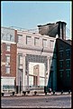 Mural of Brooklyn Bridge, New York City, with the real thing in background. (picture taken 1981).