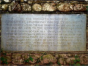 Memorial stone with carved inscription