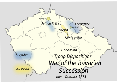 An outline map of 20th century Czechoslovakia includes most of Bohemia; the positions of the armies are marked in yellow and blue, showing Joseph's army (yellow) in a line of fortifications and surrounded at front and rear by Henry and Frederick (blue).