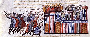 Depiction of an army attacking a walled town