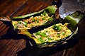 'Pam khai mot': ant eggs mixed with chicken eggs are slowly grilled inside a banana leaf cup over a low fire