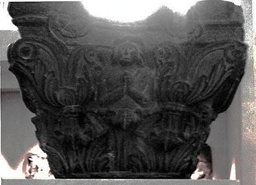 Back-lit, dark-coloured carving