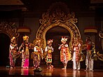 Arja (drama), a traditional Balinese performing art that blends dance, drama, and music to depict epic stories and local legends.