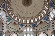 The small Rüstem Pasha Mosque (1561) is an early example of Sinan's use of an octagonal support system.[103]