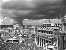 View across the city with smoke column